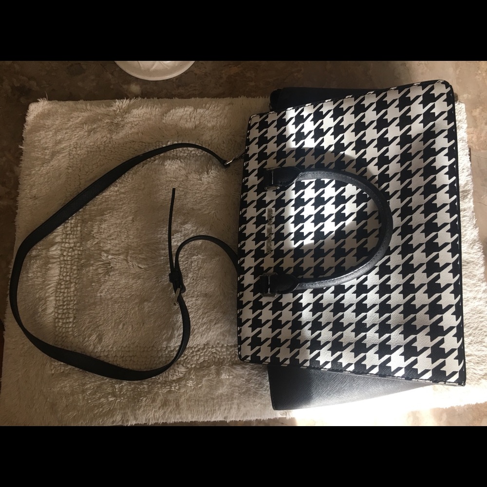A black and white tote is clean no stains